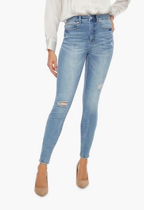 Jeans con roturas cintura alta